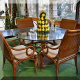 F70. Bamboo and glass top patio set. 